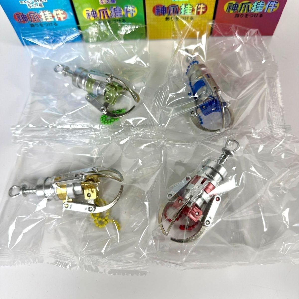 Amazon.co.jp: ミニクレーンゲーム アームキーホルダー 爪が開閉する